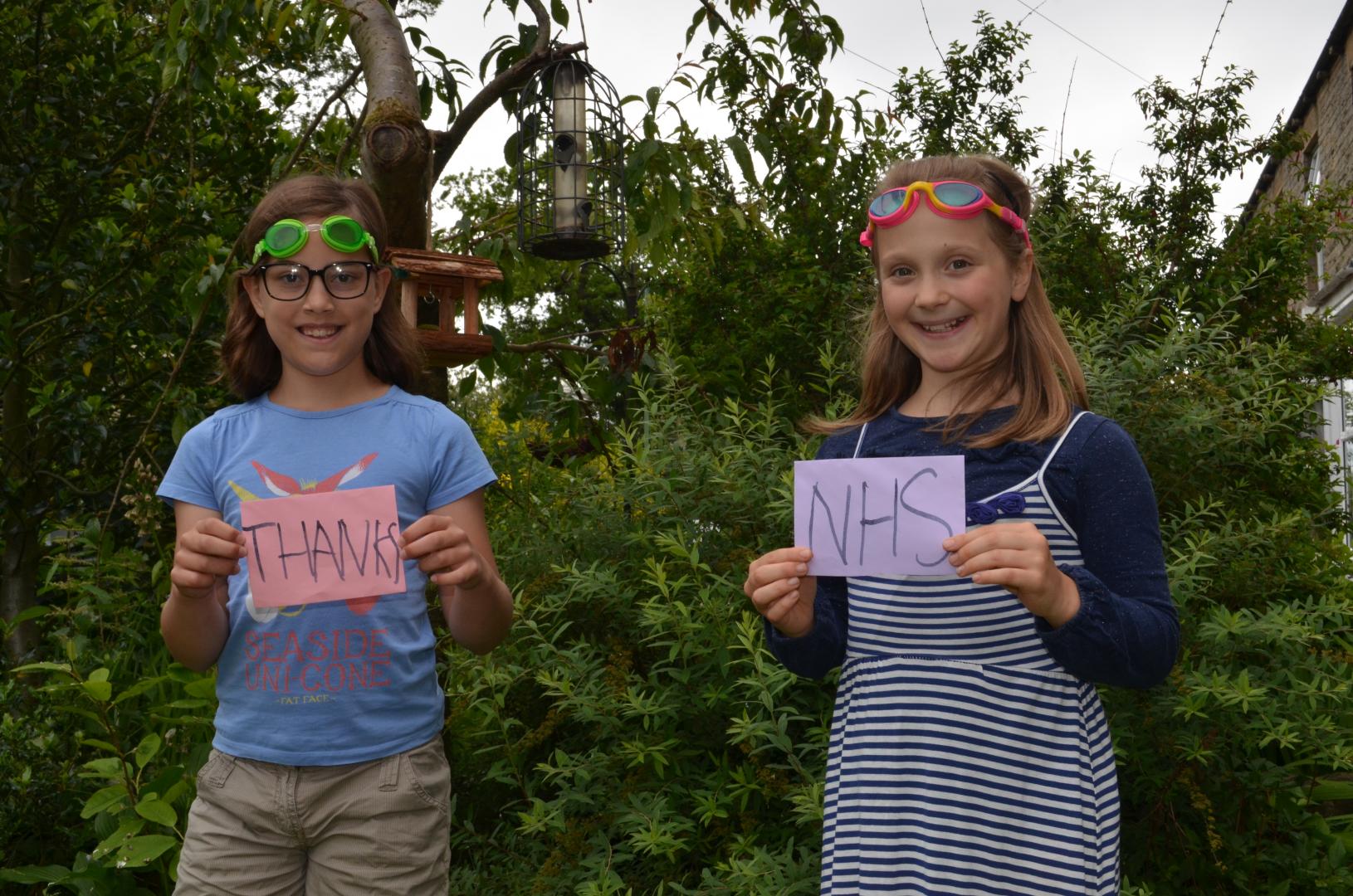 Girls’ sponsored river swim raises cash for NHS