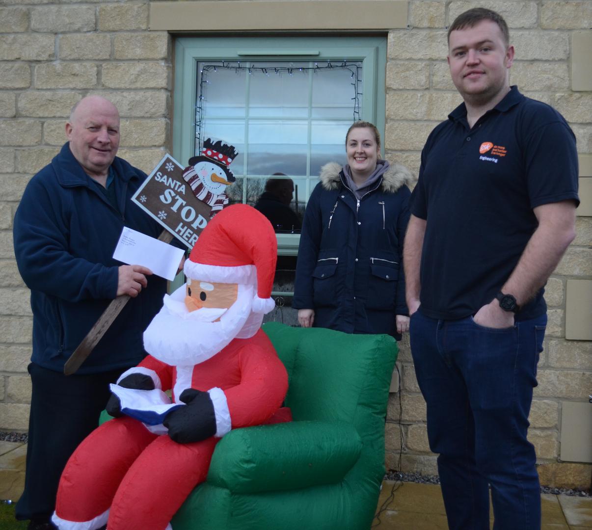 Couple celebrate after taking prize for giving village sparkle