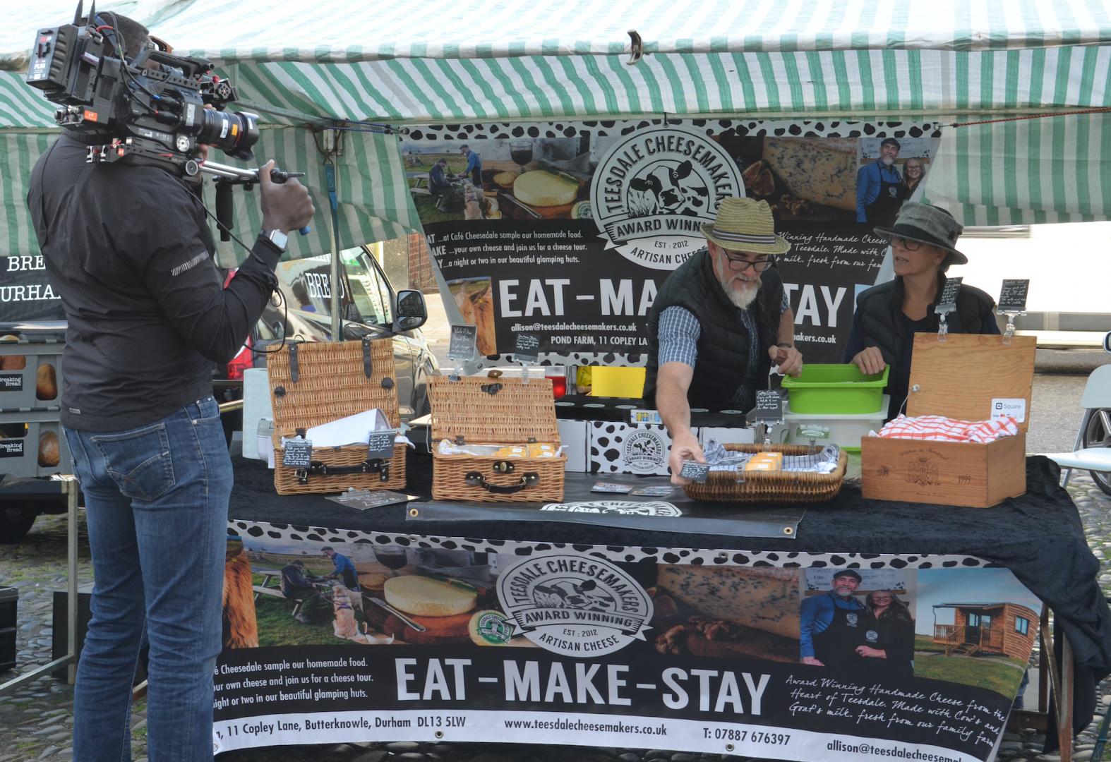 Showdown at the farmers’ market as TV cameras roll
