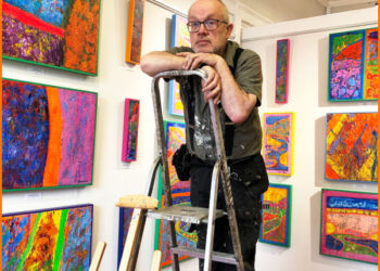 ART SHOW: Simon Pell prepares his exhibition of vibrant, colourful pictures at TCR Hub, Barnard Castle. It opens on March 10 and runs to May 22