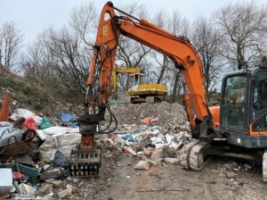 Waste management firm fined after worker run over by excavator